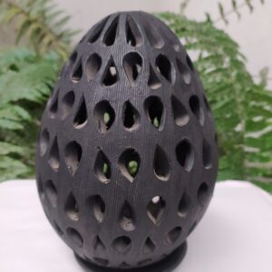 Lámpara de huevo mediano rayado y calado de gotas